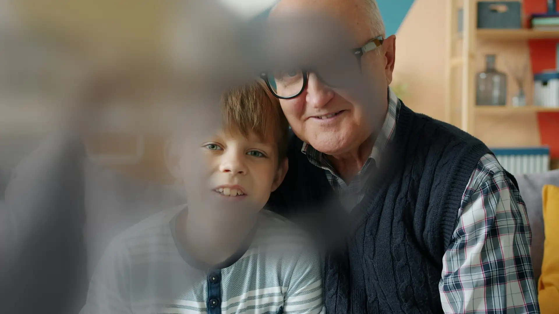 Simulation of vision with glaucoma: a grandfather and grandson seen with a sharp centre and blurred areas around it